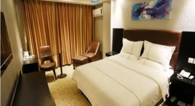 Kunlun Leju Business Hotel (Wenxian), Prenota Hotel Hotel a Henan con parcheggio, Parcheggio