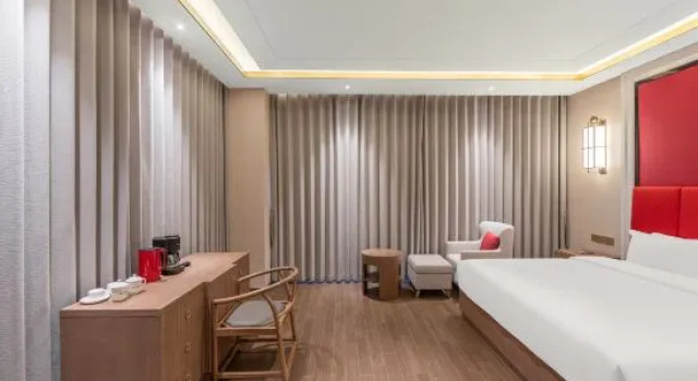 Люкс Presidential XunXianHuajing International Hotel ( Ancient City West Gate)