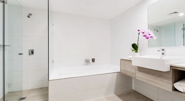 Люкс с красивым видом из окна Miramare Gardens Boutique Accommodation