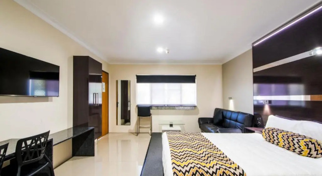 Семейный номер Deluxe Abbey Motor Inn