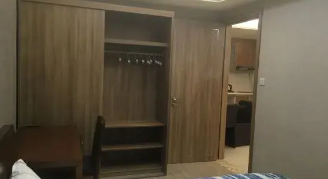 Люкс Deluxe с видом на сад Yumi Holiday Apartment (Changjiang Qizi Bay)