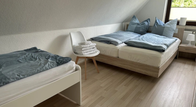 Трёхместный семейный номер Standard с видом на сад Gästehaus Bremer