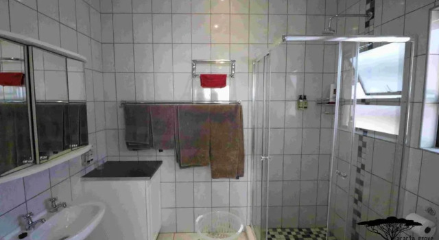 Апартаменты Acacia Grove Guest House