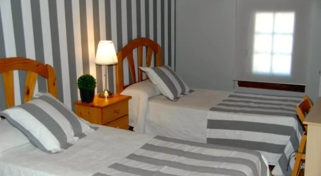Четырёхместный номер Hostal Cervantes
