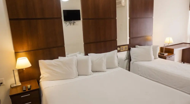 Трёхместный семейный номер Standard Ibituruna Center Hotel