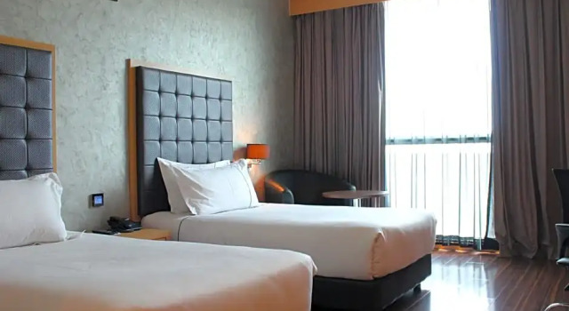O podwyższonym standardzie pokój Symphony Suites Hotel