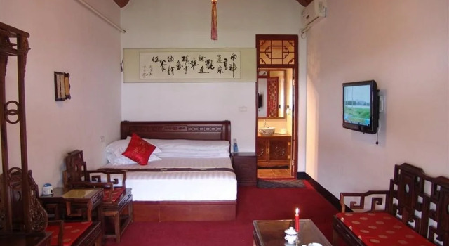 Pingyao Xing Long Yi Guesthouse, Забронировать Отель Отели Пинъяо с парковкой, рядом с Ji's Old Residence, Парковка