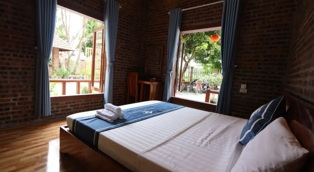 Номер Deluxe Phạm Gia Homestay Ecogarden