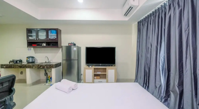Апартаменты Cozy with Minimalist Style Studio Apartment Nine Residence