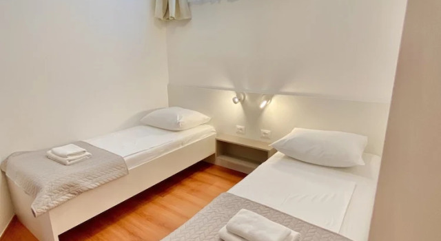 Семейные апартаменты Цокольный этаж с 2 комнатами с балконом Stipe Residence