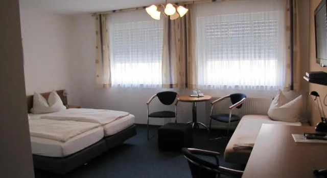 Четырёхместный номер Standard Hotel Am Weyerhof