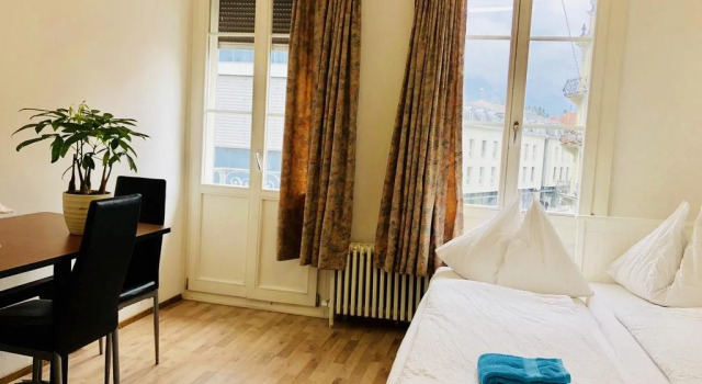 Happy central apartment, Забронировать Апартаменты/квартира Интерлакен Берн кантон, рядом с Железнодорожный вокзал Интерлакен Западный