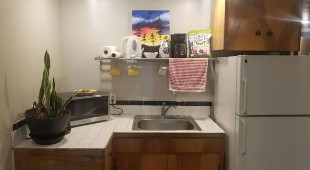 Апартаменты Central 2 bedroom unit with 3 beds and 3 large TVs