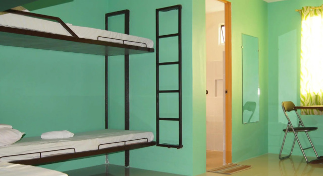 Vuode makuusalissa Staylite Park B&B