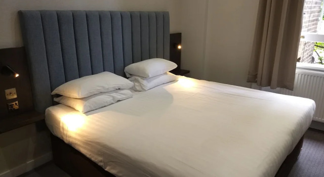 Четырёхместный номер Standard Garden Court Hotel