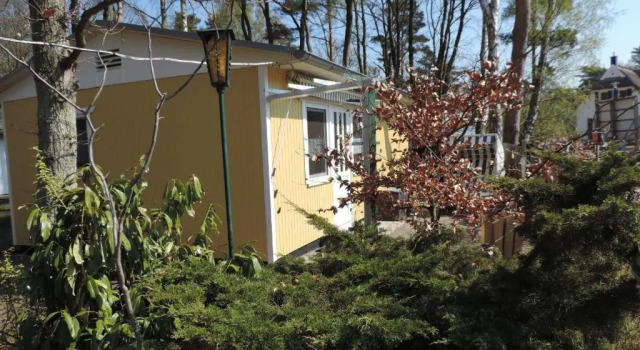 Коттедж Ferienhaus Am Dünenwald