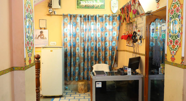 Кровать в общем номере Jamna Vilas Guest House