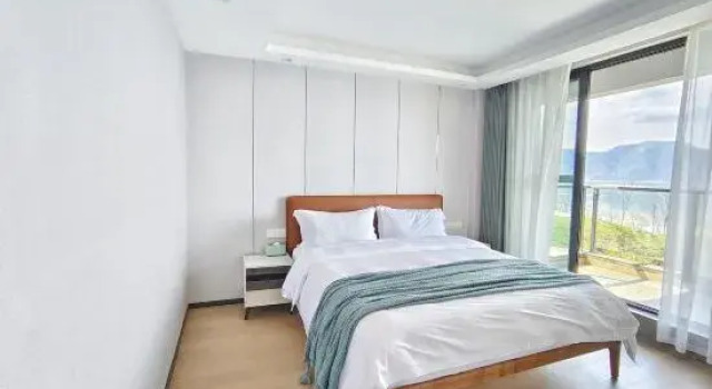 Люкс с 3 комнатами с видом на озеро Huangshan Taiping Lake Shancheng Jiushi Vacation Apartment