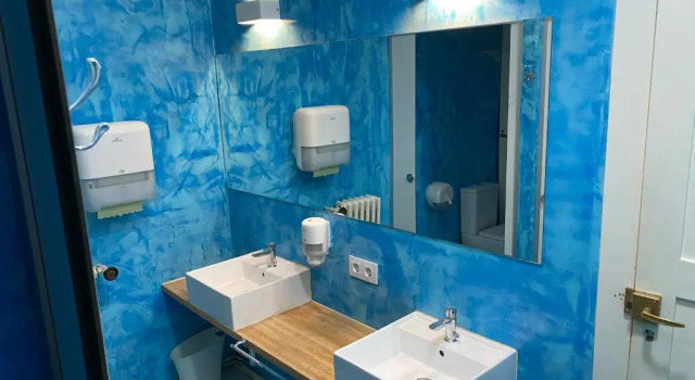 Кровать в общем номере Albergue O Santo