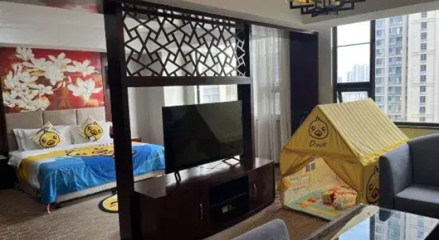 Номер Deluxe New Land Hotel