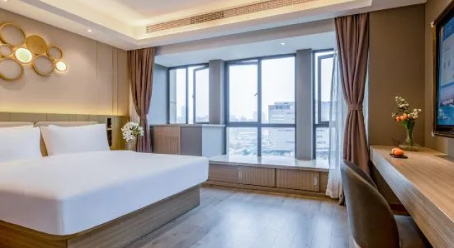 Люкс Deluxe Orange Hotel (Hangzhou Jinshahu Yintai Department Store)