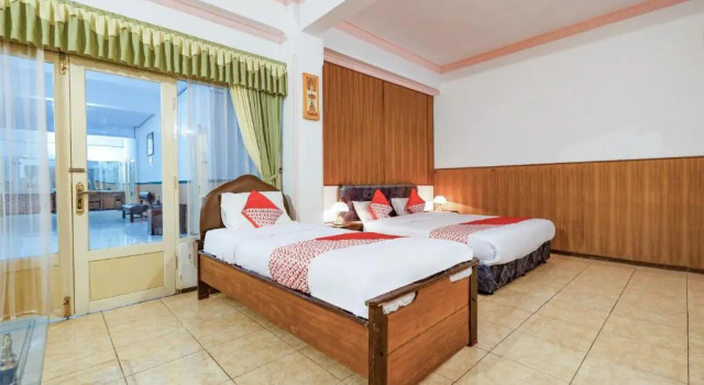 Suite familiar Sartika Hotel Mitra RedDoorz Pati