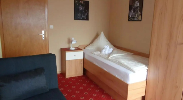 Апартаменты Hotel "Haus am Berg"