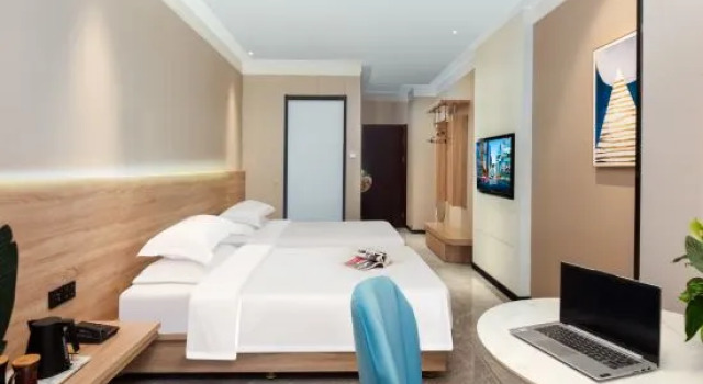Кровать в общем номере Bindao Holiday Inn(Tanggu Commercial Center Store, Binhai New Area)