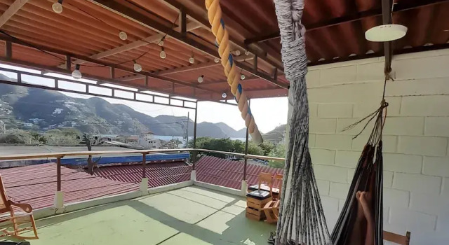 Кровать в общем номере Отель Taganga Tropical House