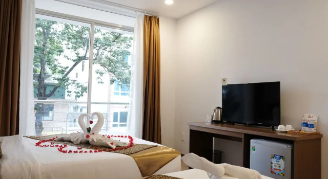 Трёхместный номер Deluxe с балконом The Umi Hotel