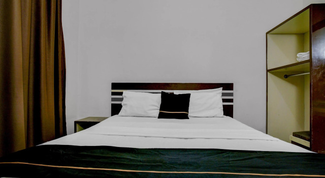 Номер Standard OYO 765 Wisma Andalas Asri Syariah
