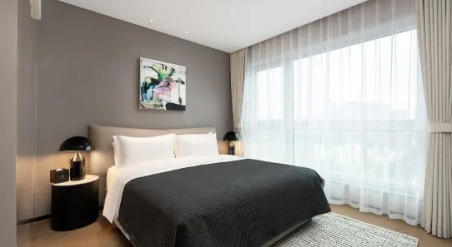 Семейный люкс с 2 комнатами Chengdu Gausmann Service Apartment