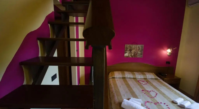 Четырёхместный номер Standard Дуплекс Hotel Duca Della Corgna