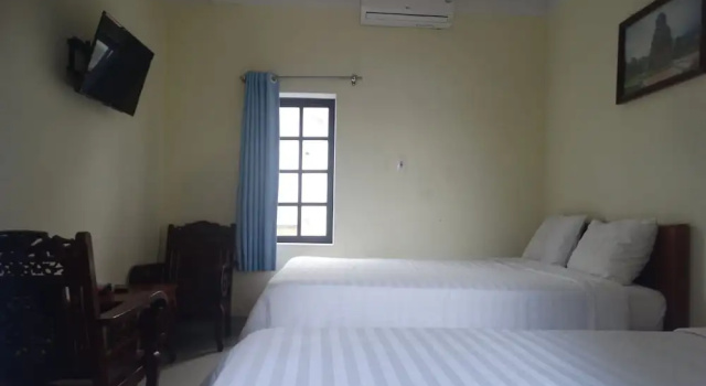 Трёхместный номер Standard с балконом и с видом на сад Yellow House Homestay