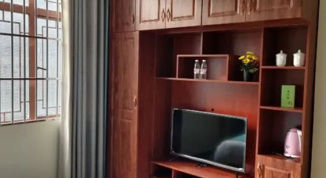Xingyi Biantun Homestay, Varaa Hotelli Xingyi Guizhou