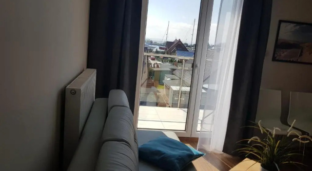 Апартаменты Дуплекс с 2 комнатами с балконом и с видом на море Marina Jastarnia Apartamenty w budynku z Basenem