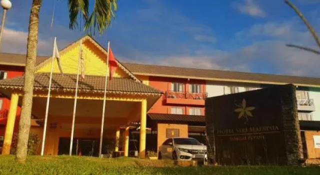 Кровать в общем номере Hotel Seri Malaysia Sungai Petani