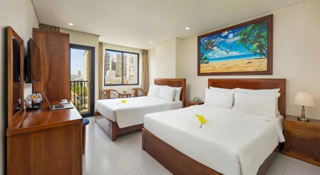 Четырёхместный номер Deluxe Cherry Hotel & Apartment Da Nang - Phoenix 2 Hotel
