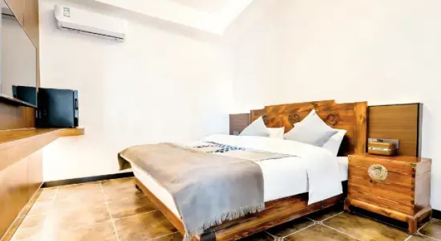 Люкс Lijiang Jian Shan Lu Homestay