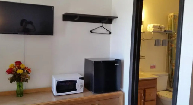 Четырёхместный номер Standard American Inn Motel Cañon City