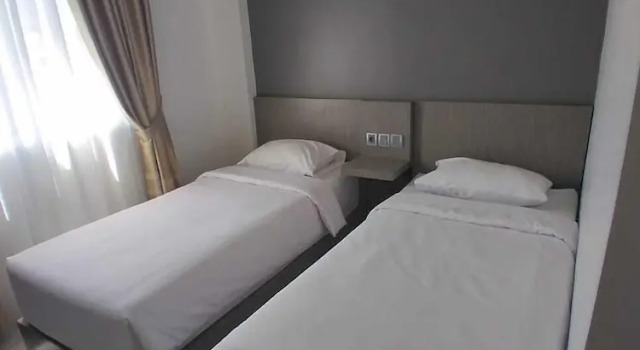 Двухместный номер Standard PURNAMA BALIGE HOTEL