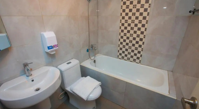 Четырёхместный номер Standard S&E Hotel