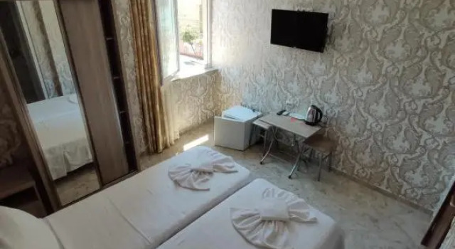 Четырёхместный номер Deluxe hotel Vaxx