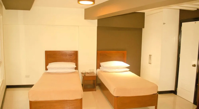 Luksusowy czteroosobowy pokój Palawan Palm Suites
