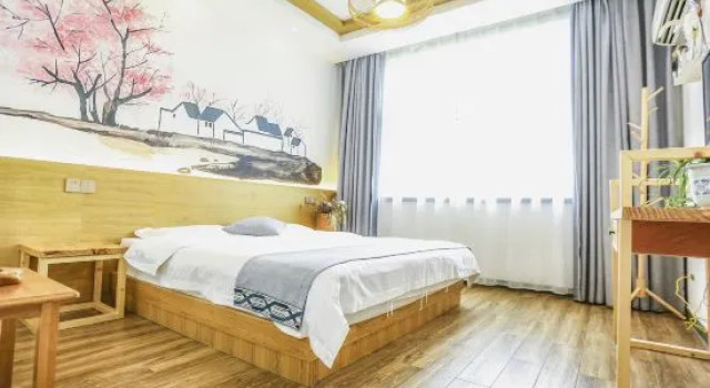 Wuzhen Small Town Romance Homestay, Забронировать Отель Отели в центре Учжэнь, в центре