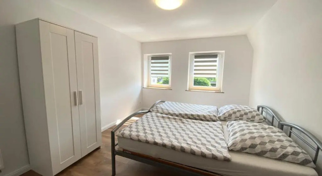 Апартаменты Ferienwohnung mit Balkon und Garten OG