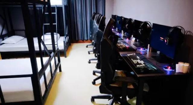 Кровать в общем номере Fantasy E-Sports Hotel (Zhengzhou Erqi Wanda Plaza)