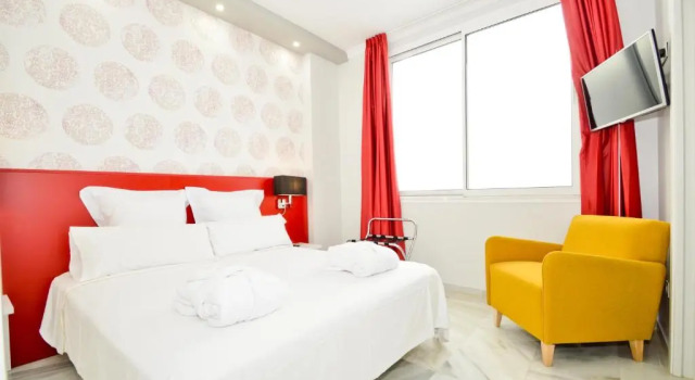 Апартаменты Deluxe The Zentral Arenal Suites