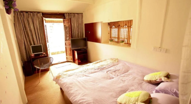 Lijiang Xieyiju Hostel, Забронировать Хостел Лицзян Юньнань, рядом с Улица Сквер-стрит Древнего города Даянь