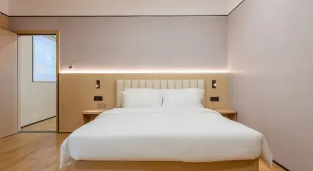 Люкс с 2 комнатами Yueshang Hotel (Guangzhou Olympic Sports Center Shenzhou Road Subway Station Branch)